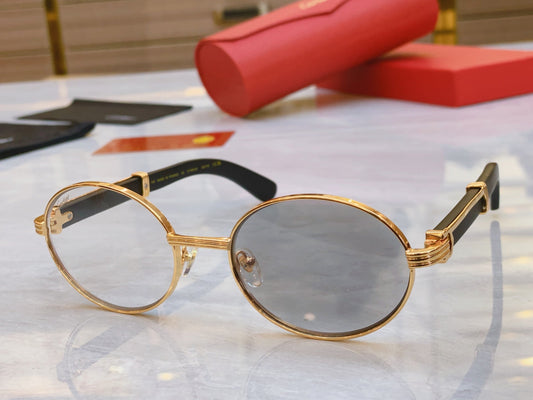 High end color changing gold framed oval sunglasses