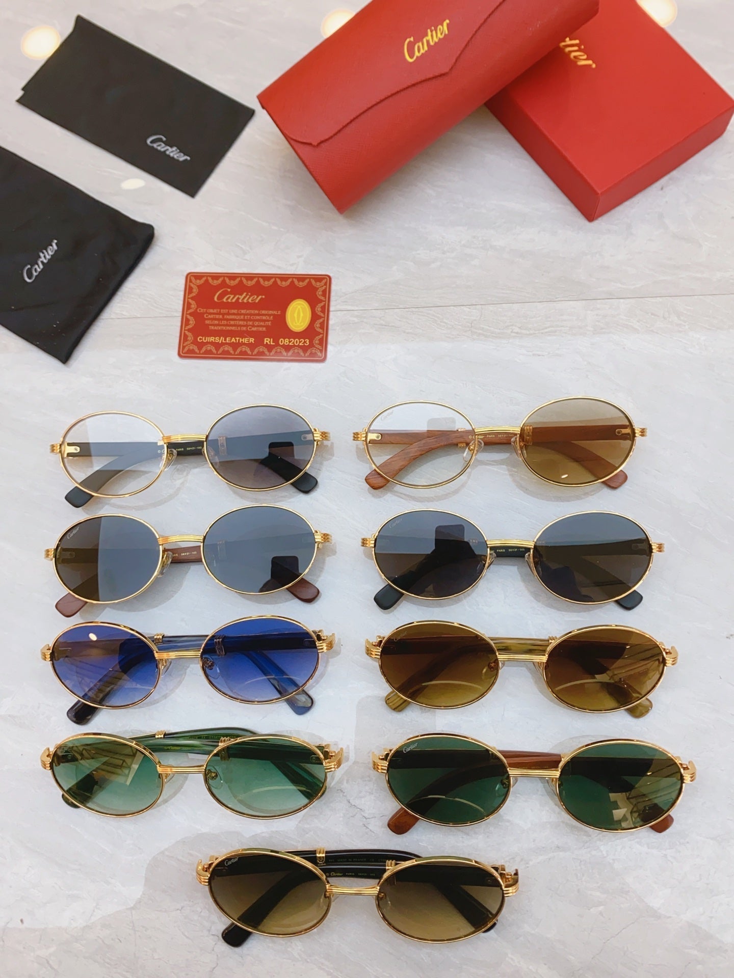 High end oval sunglasses with gold frame