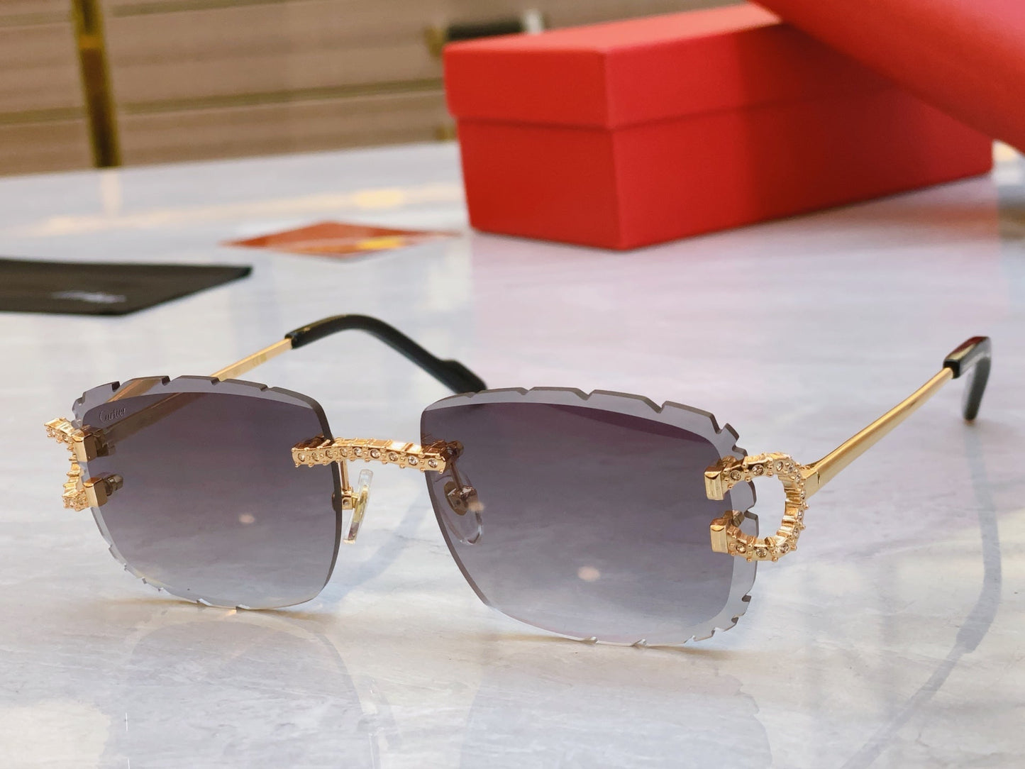 High end sunglasses with precision cutting and diamond inlay