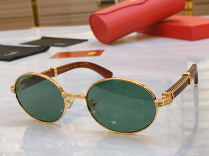 High end oval sunglasses with gold frame