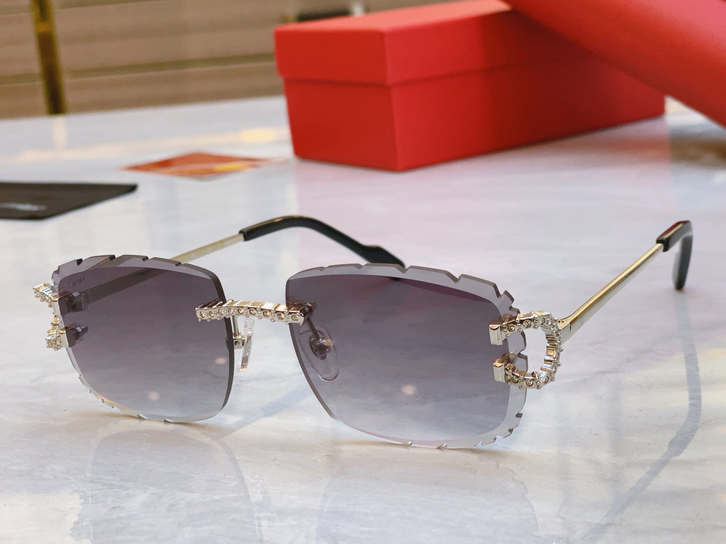 High end sunglasses with precision cutting and diamond inlay