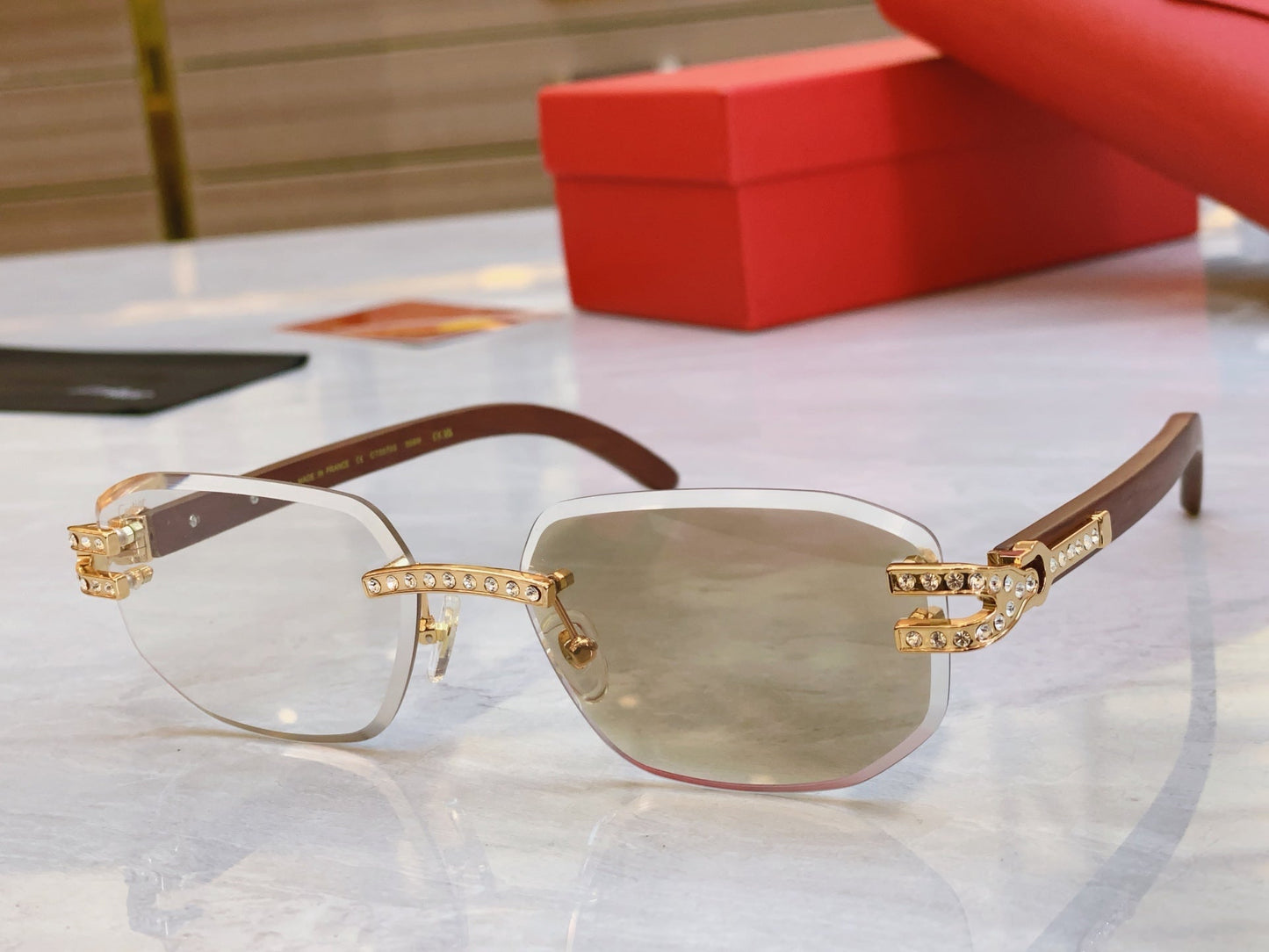 High end diamond studded color changing sunglasses paired with wooden legs