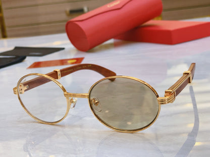 High end color changing gold framed oval sunglasses