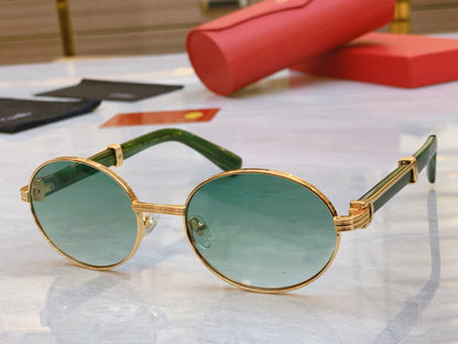 High end oval sunglasses with gold frame