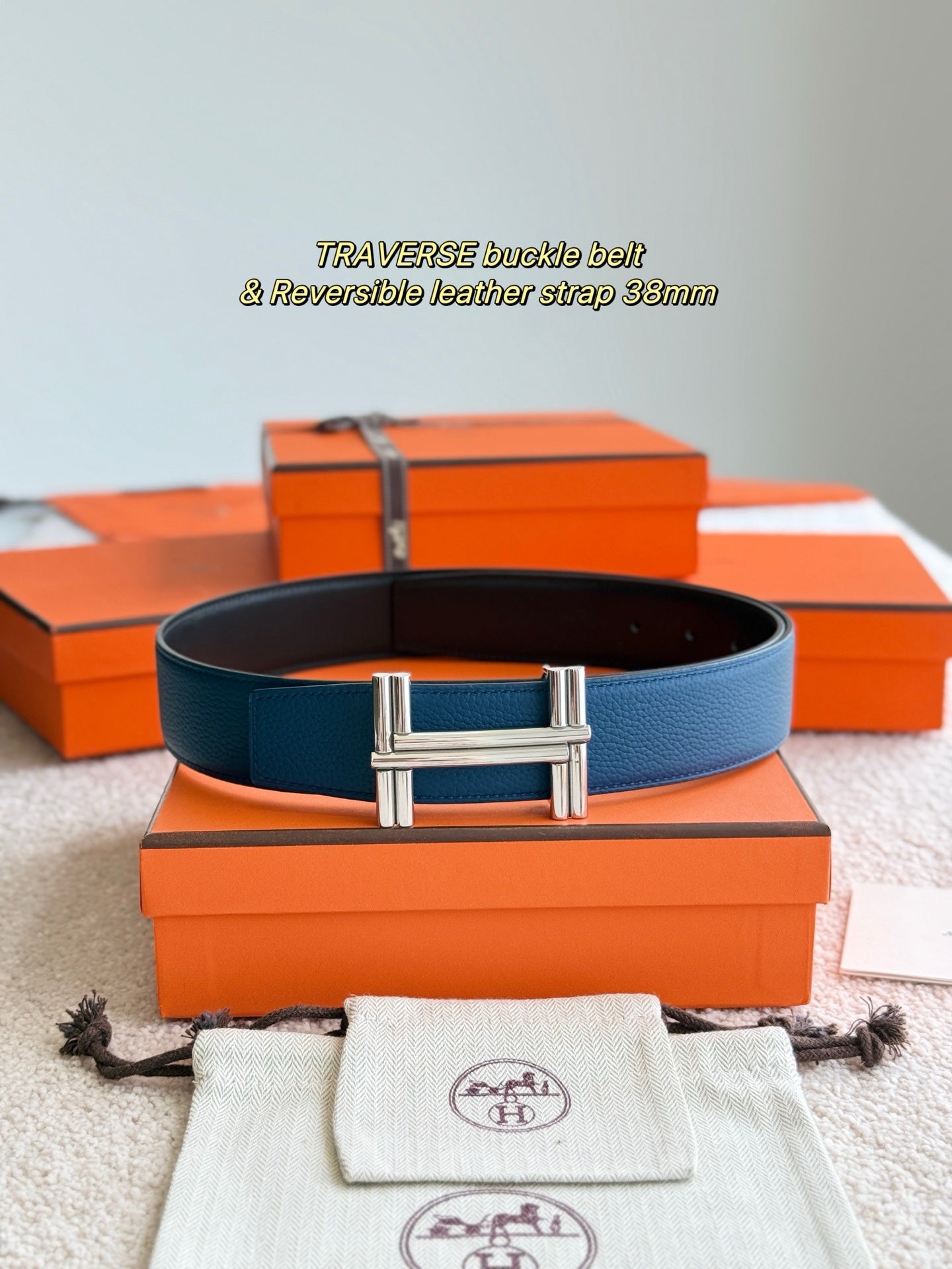 Premium hardware paired with a deep blue togo leather belt 3.8cm
