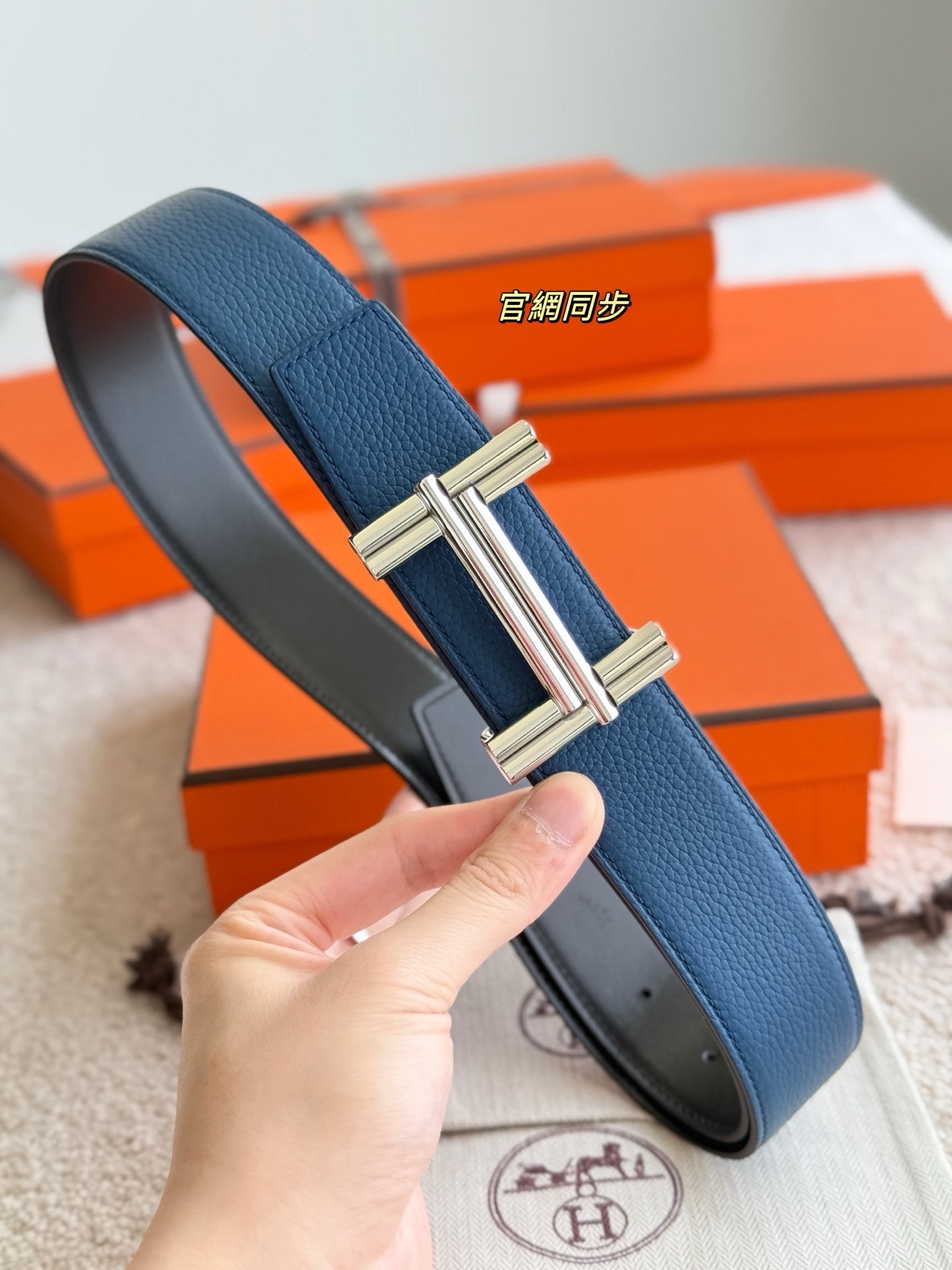 Premium hardware paired with a deep blue togo leather belt 3.8cm