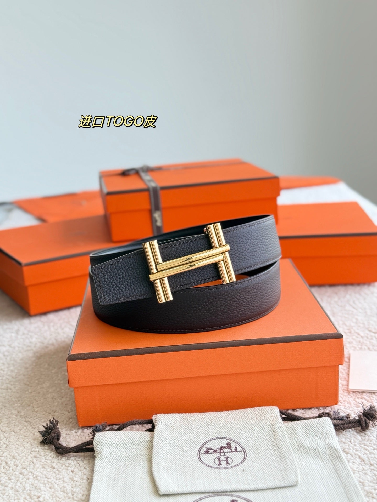 Premium hardware paired with a chocolate togo leather belt 3.8cm